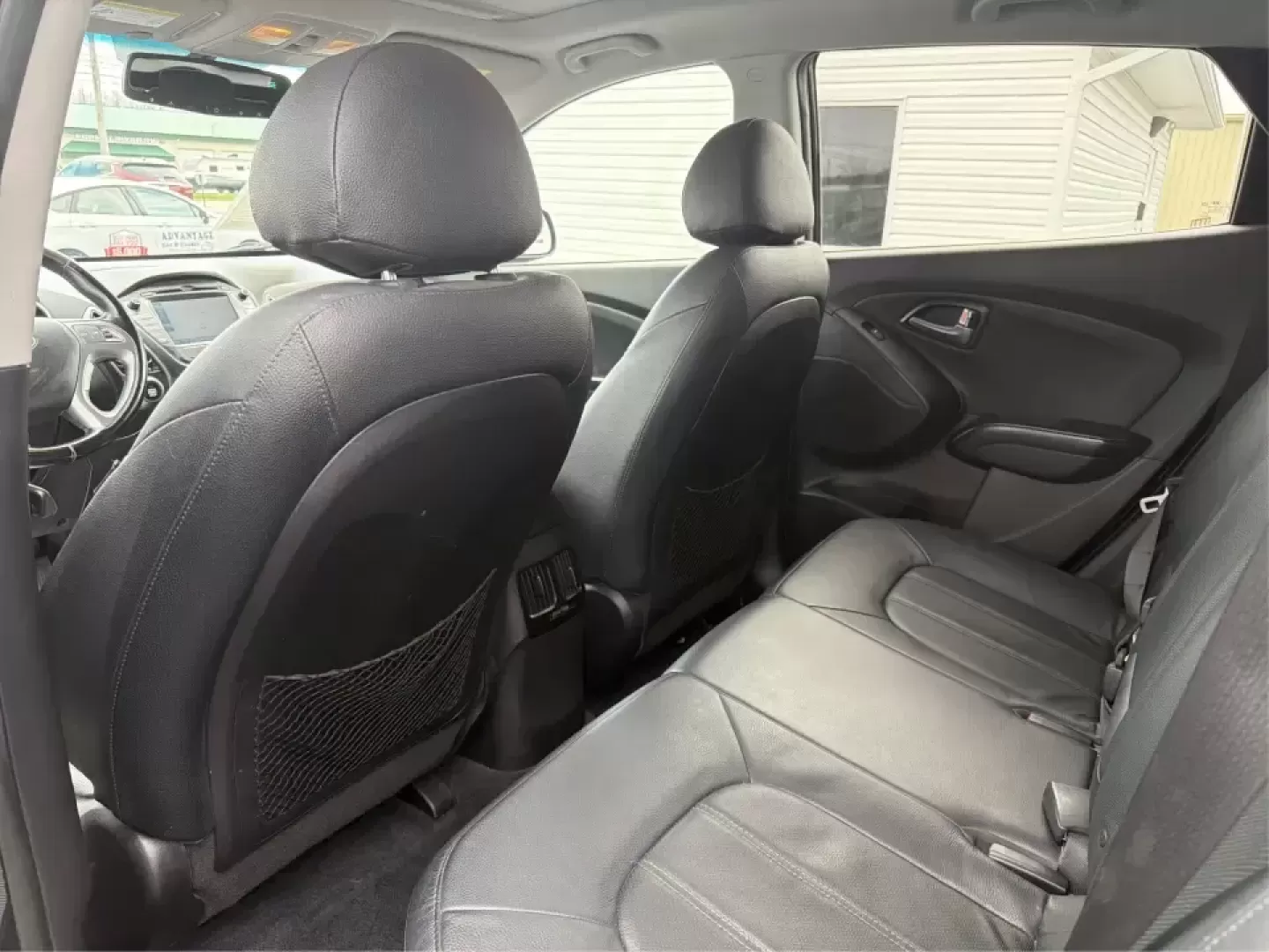 2015 Hyundai Tucson Limited (KM8JU3AG5FU) with an Theta II 2.4L I-4 gasoline direct injection engine, 6-Speed Automatic transmission, located at 8750 N County Rd 25A, Piqua, OH, 45356, (937) 908-9800, 40.164391, -84.232513 - Need a dependable SUV that fits real life-school drop-offs, long commutes up I75, and weekend getaways to Indian Lake or a quick lap around downtown Piqua? This 2015 Hyundai Tucson Limited is built for the everyday hustle with the comfort and tech that make each mile easier, whether you're running e - Photo#10