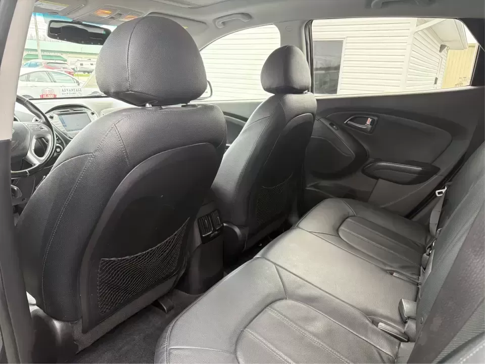 2015 Hyundai Tucson Limited (KM8JU3AG5FU) with an Theta II 2.4L I-4 gasoline direct injection engine, 6-Speed Automatic transmission, located at 8750 N County Rd 25A, Piqua, OH, 45356, (937) 908-9800, 40.164391, -84.232513 - Need a dependable SUV that fits real life-school drop-offs, long commutes up I75, and weekend getaways to Indian Lake or a quick lap around downtown Piqua? This 2015 Hyundai Tucson Limited is built for the everyday hustle with the comfort and tech that make each mile easier, whether you're running e - Photo#10