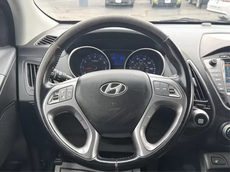 2015 Hyundai Tucson Limited (KM8JU3AG5FU) with an Theta II 2.4L I-4 gasoline direct injection engine, 6-Speed Automatic transmission, located at 8750 N County Rd 25A, Piqua, OH, 45356, (937) 908-9800, 40.164391, -84.232513 - Need a dependable SUV that fits real life-school drop-offs, long commutes up I75, and weekend getaways to Indian Lake or a quick lap around downtown Piqua? This 2015 Hyundai Tucson Limited is built for the everyday hustle with the comfort and tech that make each mile easier, whether you're running e - Photo#16
