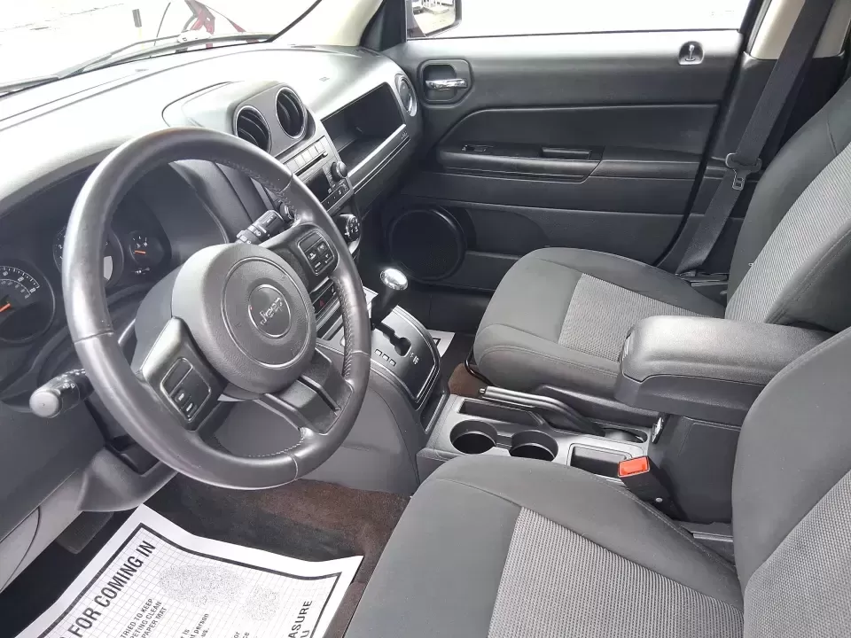 2014 Jeep Patriot Latitude (1C4NJPFB3ED) with an 2.4L L4 DOHC 16V engine, located at 8750 N County Rd 25A, Piqua, OH, 45356, (937) 908-9800, 40.164391, -84.232513 - Pack up the snacks, cue the playlist, and point the hood toward your next weekend escape-this 2014 Jeep Patriot Latitude is the kind of practical SUV that fits real life in West Central Ohio, whether you're commuting daily, shuttling kids to practice, or chasing fall colors on a backroad drive. Fini - Photo#9