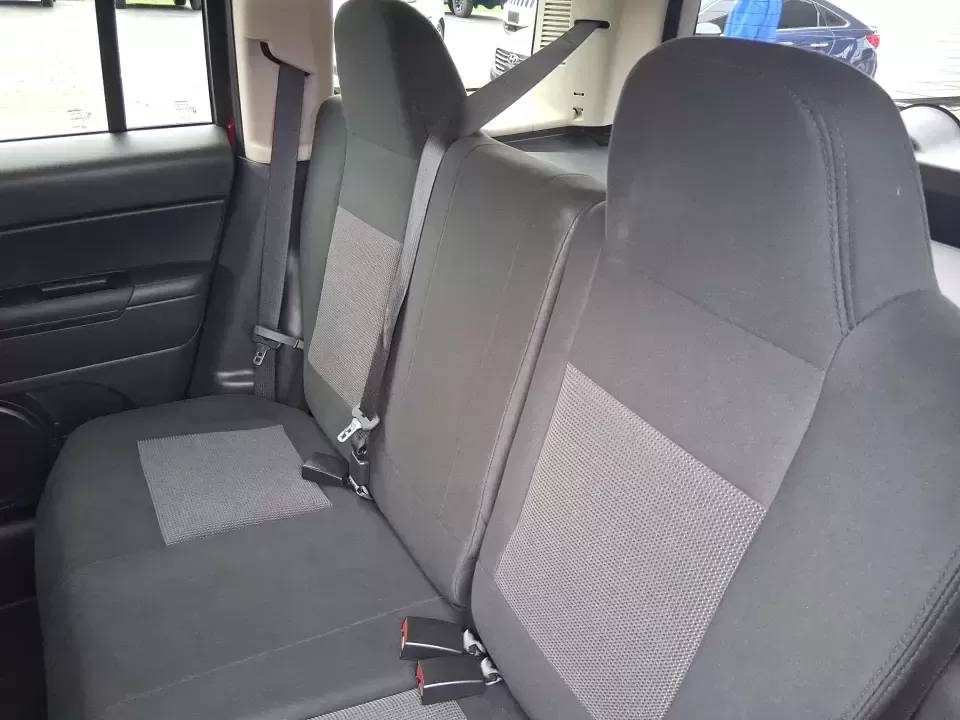 2014 Jeep Patriot Latitude (1C4NJPFB3ED) with an 2.4L L4 DOHC 16V engine, located at 8750 N County Rd 25A, Piqua, OH, 45356, (937) 908-9800, 40.164391, -84.232513 - Pack up the snacks, cue the playlist, and point the hood toward your next weekend escape-this 2014 Jeep Patriot Latitude is the kind of practical SUV that fits real life in West Central Ohio, whether you're commuting daily, shuttling kids to practice, or chasing fall colors on a backroad drive. Fini - Photo#10