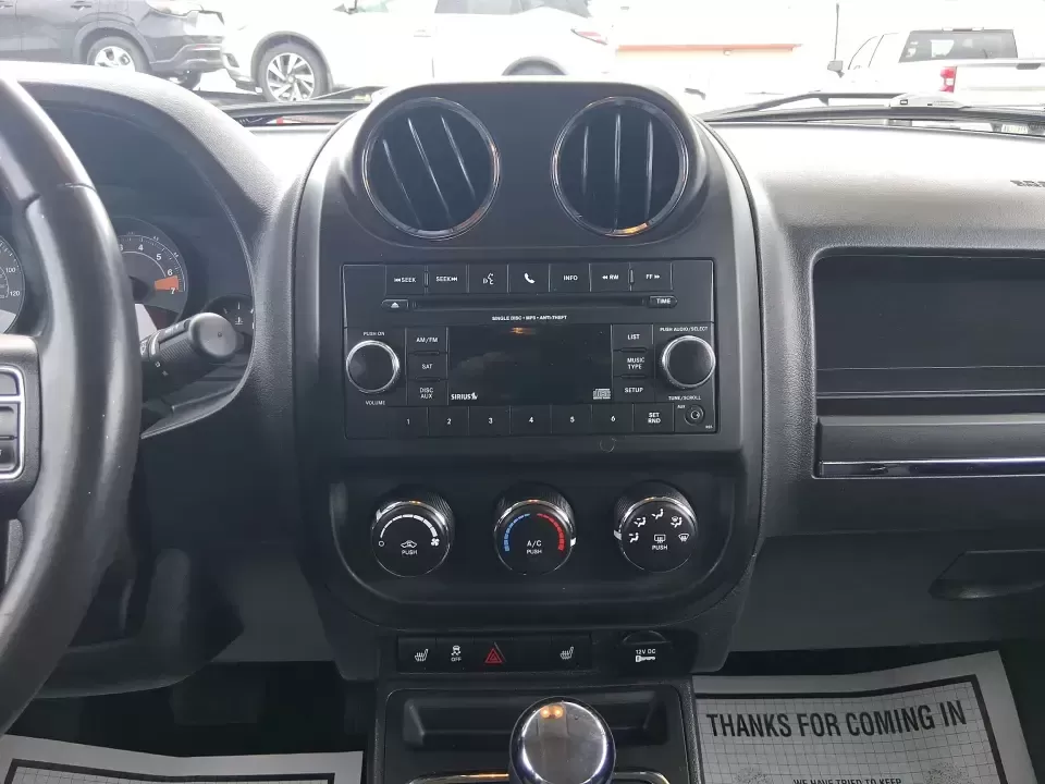 2014 Jeep Patriot Latitude (1C4NJPFB3ED) with an 2.4L L4 DOHC 16V engine, located at 8750 N County Rd 25A, Piqua, OH, 45356, (937) 908-9800, 40.164391, -84.232513 - Pack up the snacks, cue the playlist, and point the hood toward your next weekend escape-this 2014 Jeep Patriot Latitude is the kind of practical SUV that fits real life in West Central Ohio, whether you're commuting daily, shuttling kids to practice, or chasing fall colors on a backroad drive. Fini - Photo#13