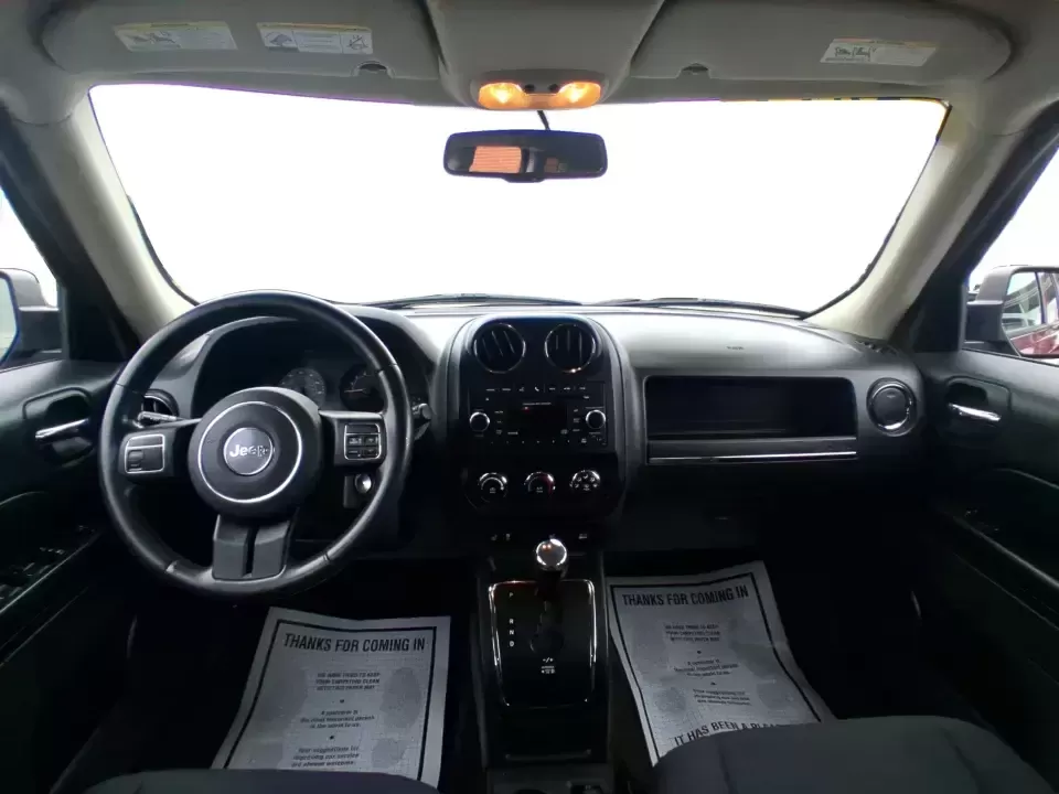 2014 Jeep Patriot Latitude (1C4NJPFB3ED) with an 2.4L L4 DOHC 16V engine, located at 8750 N County Rd 25A, Piqua, OH, 45356, (937) 908-9800, 40.164391, -84.232513 - Pack up the snacks, cue the playlist, and point the hood toward your next weekend escape-this 2014 Jeep Patriot Latitude is the kind of practical SUV that fits real life in West Central Ohio, whether you're commuting daily, shuttling kids to practice, or chasing fall colors on a backroad drive. Fini - Photo#19