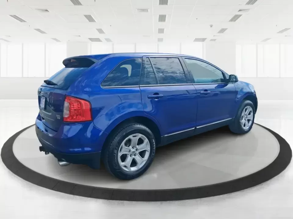 2013 Ford Edge SEL (2FMDK4JC3DB) with an 3.5L V-6 DOHC engine, 6-Speed Automatic transmission, located at 1099 N County Rd 25A , Troy, OH, 45373, (937) 908-9800, 40.057079, -84.212883 - Pack up the kids, cue up your favorite playlist, and point the nose toward a weekend getaway-this 2013 Ford Edge SEL is the kind of comfortable, confident SUV that fits real life in Troy, Ohio. Whether you're commuting up SR-25A, running after-school errands near downtown Troy, or loading up for a r - Photo#2