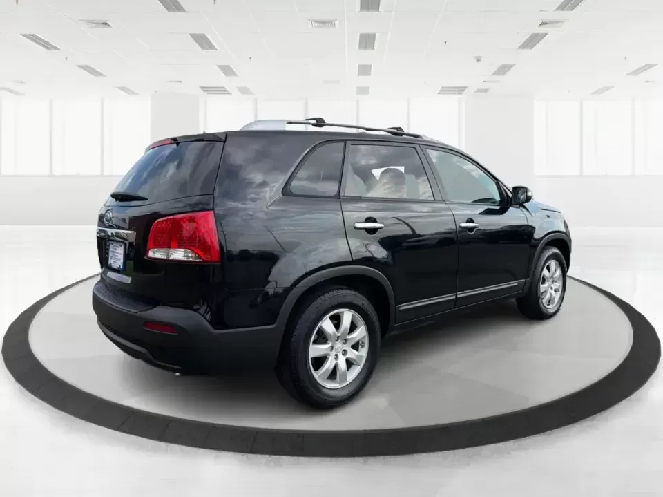 2012 Kia Sorento LX (5XYKT3A68CG) with an 2.4L I-4 gasoline direct injection engine, 6-Speed Automatic transmission, located at 1230 East Main St, Xenia, OH, 45385, (937) 908-9800, 39.688026, -83.910172 - Weekend getaways to John Bryan State Park, daily school drop-offs around Xenia, or an easy commute toward Beavercreek and Dayton-this Ebony Black 2012 Kia Sorento LX is the kind of SUV that fits real life. With practical space, confident road manners, and comfort features you'll appreciate on longer - Photo#2