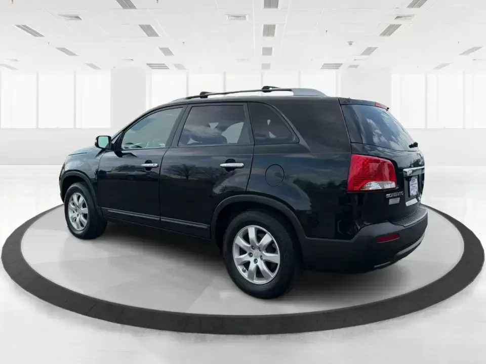 2012 Kia Sorento LX (5XYKT3A68CG) with an 2.4L I-4 gasoline direct injection engine, 6-Speed Automatic transmission, located at 1230 East Main St, Xenia, OH, 45385, (937) 908-9800, 39.688026, -83.910172 - Weekend getaways to John Bryan State Park, daily school drop-offs around Xenia, or an easy commute toward Beavercreek and Dayton-this Ebony Black 2012 Kia Sorento LX is the kind of SUV that fits real life. With practical space, confident road manners, and comfort features you'll appreciate on longer - Photo#4