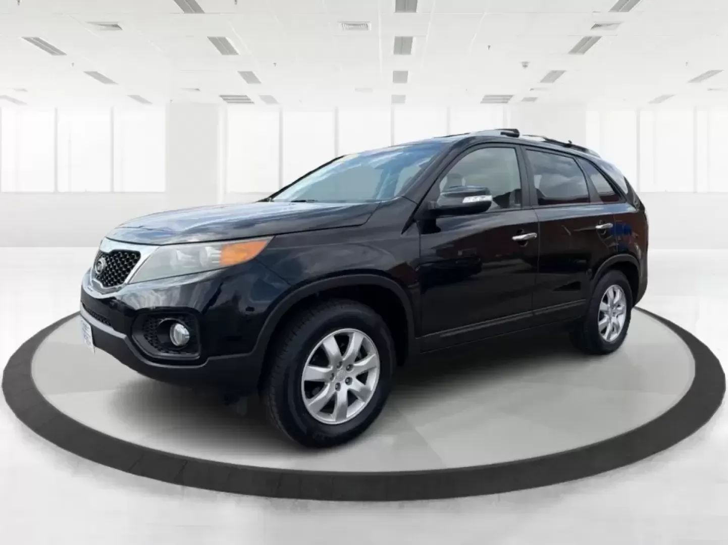 2012 Kia Sorento LX (5XYKT3A68CG) with an 2.4L I-4 gasoline direct injection engine, 6-Speed Automatic transmission, located at 1230 East Main St, Xenia, OH, 45385, (937) 908-9800, 39.688026, -83.910172 - Weekend getaways to John Bryan State Park, daily school drop-offs around Xenia, or an easy commute toward Beavercreek and Dayton-this Ebony Black 2012 Kia Sorento LX is the kind of SUV that fits real life. With practical space, confident road manners, and comfort features you'll appreciate on longer - Photo#8