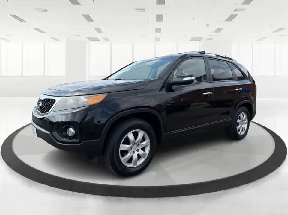 2012 Kia Sorento LX (5XYKT3A68CG) with an 2.4L I-4 gasoline direct injection engine, 6-Speed Automatic transmission, located at 1230 East Main St, Xenia, OH, 45385, (937) 908-9800, 39.688026, -83.910172 - Weekend getaways to John Bryan State Park, daily school drop-offs around Xenia, or an easy commute toward Beavercreek and Dayton-this Ebony Black 2012 Kia Sorento LX is the kind of SUV that fits real life. With practical space, confident road manners, and comfort features you'll appreciate on longer - Photo#8