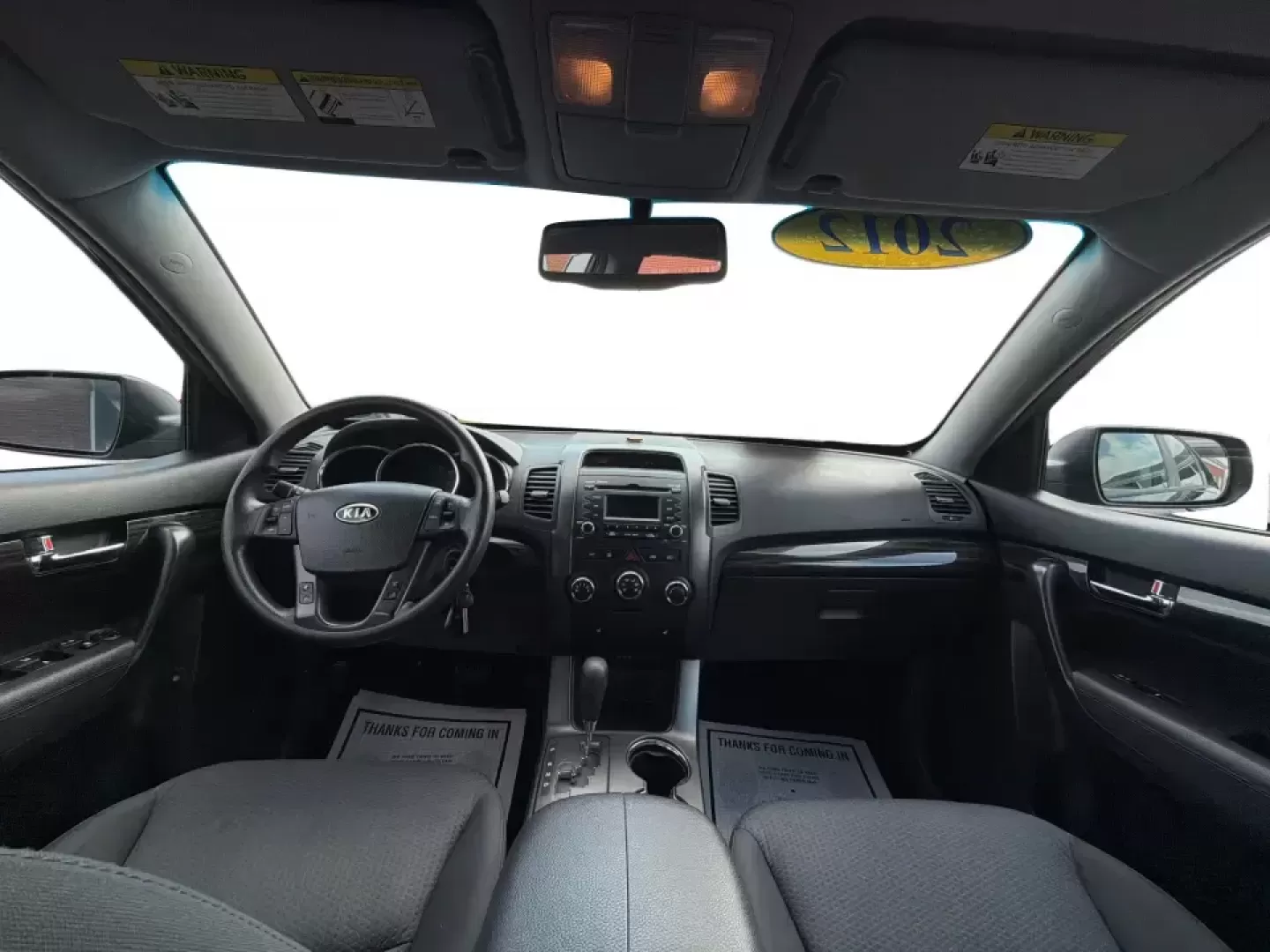 2012 Kia Sorento LX (5XYKT3A68CG) with an 2.4L I-4 gasoline direct injection engine, 6-Speed Automatic transmission, located at 1230 East Main St, Xenia, OH, 45385, (937) 908-9800, 39.688026, -83.910172 - Weekend getaways to John Bryan State Park, daily school drop-offs around Xenia, or an easy commute toward Beavercreek and Dayton-this Ebony Black 2012 Kia Sorento LX is the kind of SUV that fits real life. With practical space, confident road manners, and comfort features you'll appreciate on longer - Photo#19