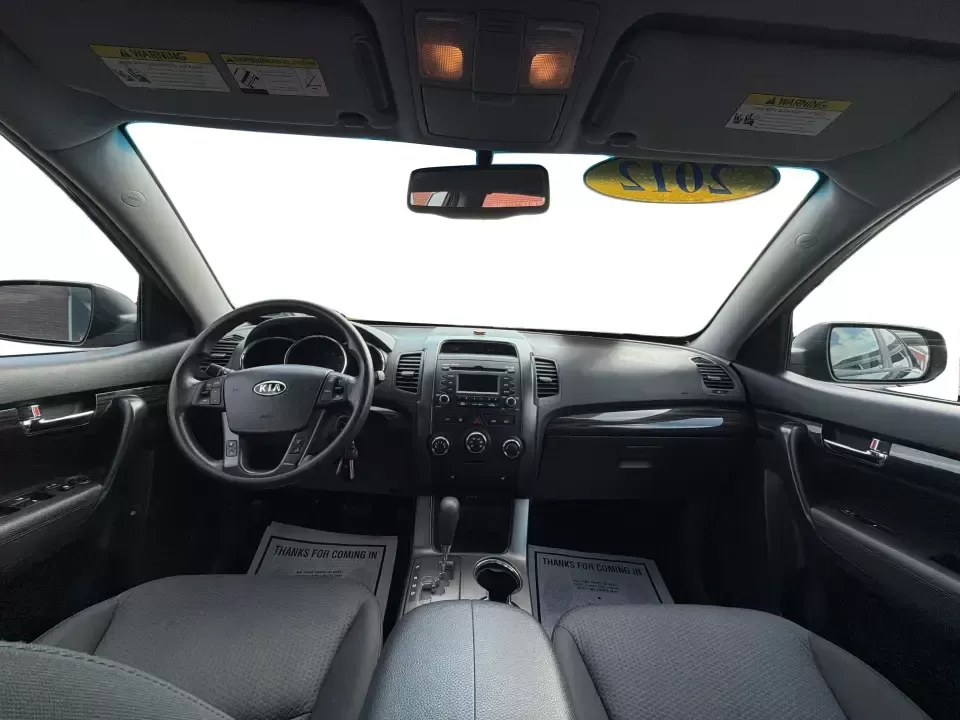 2012 Kia Sorento LX (5XYKT3A68CG) with an 2.4L I-4 gasoline direct injection engine, 6-Speed Automatic transmission, located at 1230 East Main St, Xenia, OH, 45385, (937) 908-9800, 39.688026, -83.910172 - Weekend getaways to John Bryan State Park, daily school drop-offs around Xenia, or an easy commute toward Beavercreek and Dayton-this Ebony Black 2012 Kia Sorento LX is the kind of SUV that fits real life. With practical space, confident road manners, and comfort features you'll appreciate on longer - Photo#19