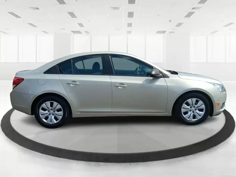 2013 Chevrolet Cruze LS Auto (1G1PA5SH4D7) with an ECOTEC 1.8L I-4 DOHC engine, 6-Speed Automatic transmission, located at 1184 Kauffman Ave, Fairborn, OH, 45324, (937) 908-9800, 39.807072, -84.030914 - Make your weekdays easier and your weekends more spontaneous with a sedan that's built for real life in Fairborn-whether you're commuting to Wright-Patterson AFB, running errands between Beavercreek and Huber Heights, or planning a quick road trip down I-675. This **2013 Chevrolet Cruze LS Auto** de - Photo#1