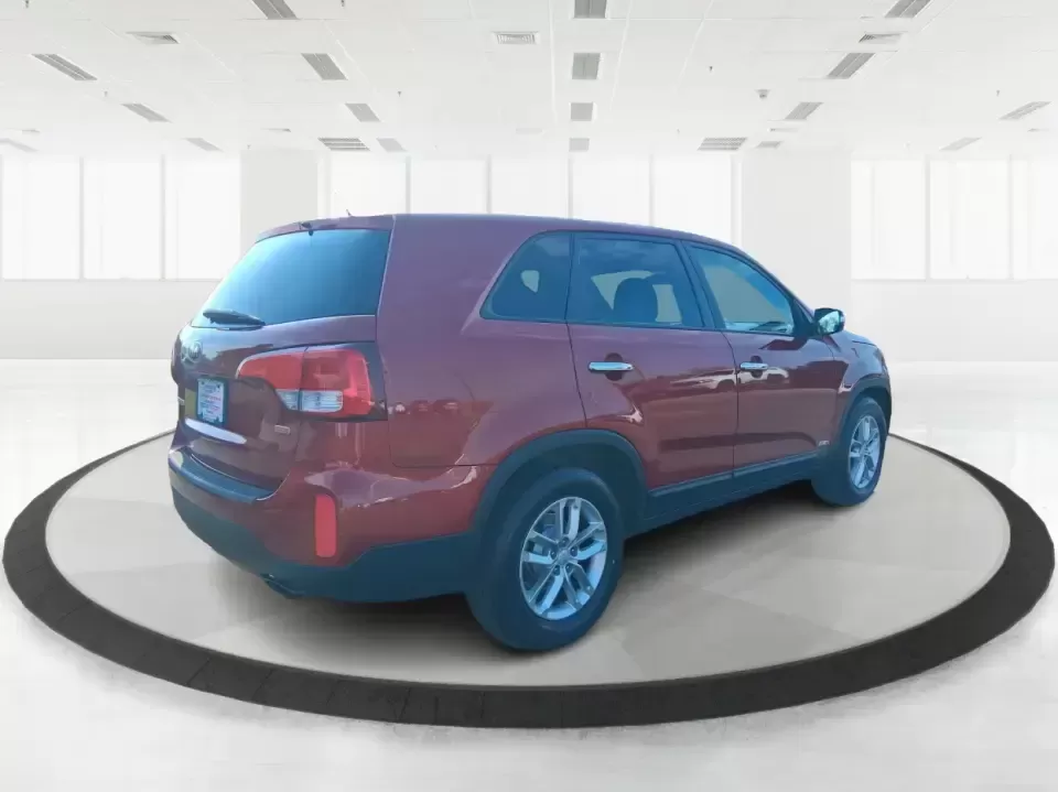 2014 Kia Sorento LX (5XYKTCA65EG) with an 2.4L I-4 gasoline direct injection engine, 6-Speed Automatic transmission, located at 1230 East Main St, Xenia, OH, 45385, (937) 908-9800, 39.688026, -83.910172 - Need one SUV that can handle Ohio winters, school drop-offs, and spontaneous weekend getaways to Indian Lake or a day trip to Dayton? This 2014 Kia Sorento LX in eye-catching Remington Red Metallic is a practical, confidence-building choice for busy families, commuters, and adventure-minded drivers - Photo#2