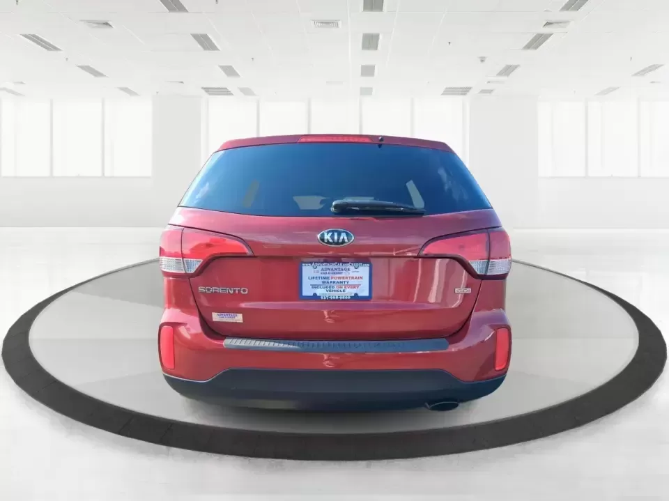 2014 Kia Sorento LX (5XYKTCA65EG) with an 2.4L I-4 gasoline direct injection engine, 6-Speed Automatic transmission, located at 1230 East Main St, Xenia, OH, 45385, (937) 908-9800, 39.688026, -83.910172 - Need one SUV that can handle Ohio winters, school drop-offs, and spontaneous weekend getaways to Indian Lake or a day trip to Dayton? This 2014 Kia Sorento LX in eye-catching Remington Red Metallic is a practical, confidence-building choice for busy families, commuters, and adventure-minded drivers - Photo#3