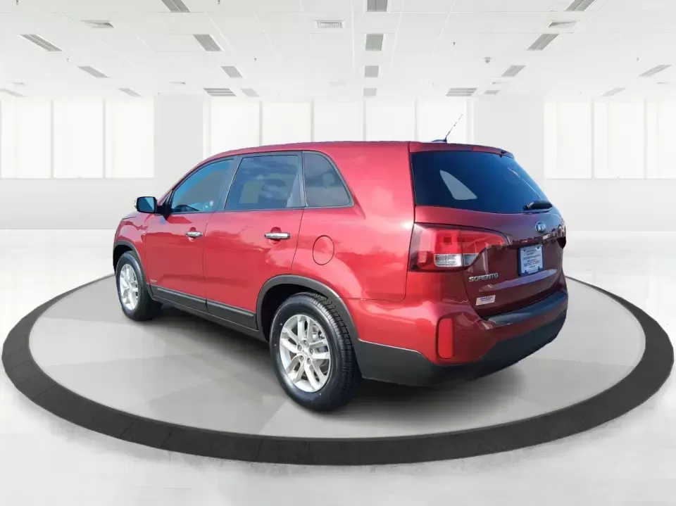 2014 Kia Sorento LX (5XYKTCA65EG) with an 2.4L I-4 gasoline direct injection engine, 6-Speed Automatic transmission, located at 1230 East Main St, Xenia, OH, 45385, (937) 908-9800, 39.688026, -83.910172 - Need one SUV that can handle Ohio winters, school drop-offs, and spontaneous weekend getaways to Indian Lake or a day trip to Dayton? This 2014 Kia Sorento LX in eye-catching Remington Red Metallic is a practical, confidence-building choice for busy families, commuters, and adventure-minded drivers - Photo#4