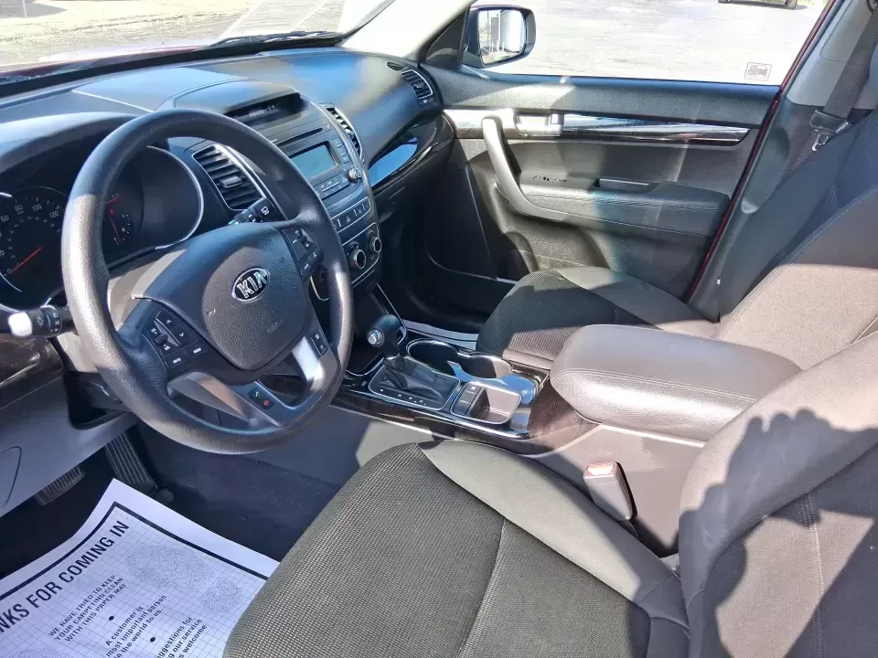 2014 Kia Sorento LX (5XYKTCA65EG) with an 2.4L I-4 gasoline direct injection engine, 6-Speed Automatic transmission, located at 1230 East Main St, Xenia, OH, 45385, (937) 908-9800, 39.688026, -83.910172 - Need one SUV that can handle Ohio winters, school drop-offs, and spontaneous weekend getaways to Indian Lake or a day trip to Dayton? This 2014 Kia Sorento LX in eye-catching Remington Red Metallic is a practical, confidence-building choice for busy families, commuters, and adventure-minded drivers - Photo#9