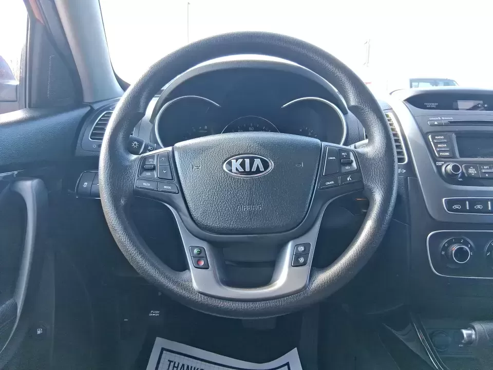 2014 Kia Sorento LX (5XYKTCA65EG) with an 2.4L I-4 gasoline direct injection engine, 6-Speed Automatic transmission, located at 1230 East Main St, Xenia, OH, 45385, (937) 908-9800, 39.688026, -83.910172 - Need one SUV that can handle Ohio winters, school drop-offs, and spontaneous weekend getaways to Indian Lake or a day trip to Dayton? This 2014 Kia Sorento LX in eye-catching Remington Red Metallic is a practical, confidence-building choice for busy families, commuters, and adventure-minded drivers - Photo#16