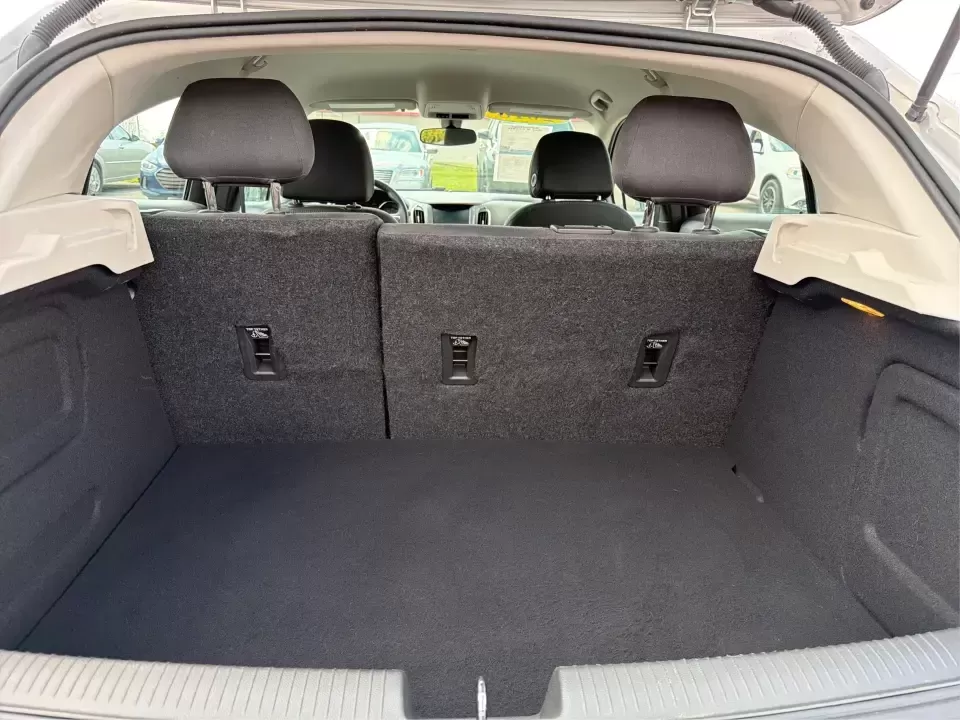 2018 Chevrolet Cruze LT Auto (3G1BE6SM8JS) with an 1.4L I-4 gasoline direct injection engine, 6A transmission, located at 880 E. National Road, Vandalia, OH, 45377, (937) 908-9800, 39.891918, -84.183594 - Pack the car, cue up your favorite playlist, and head out for a weekend getaway-this 2018 Chevrolet Cruze LT Auto Hatchback is the kind of practical, fuel-sipping daily driver that also shines for road trips, errands, and campus or work commutes around Vandalia. With its easy-to-park hatchback versa - Photo#12