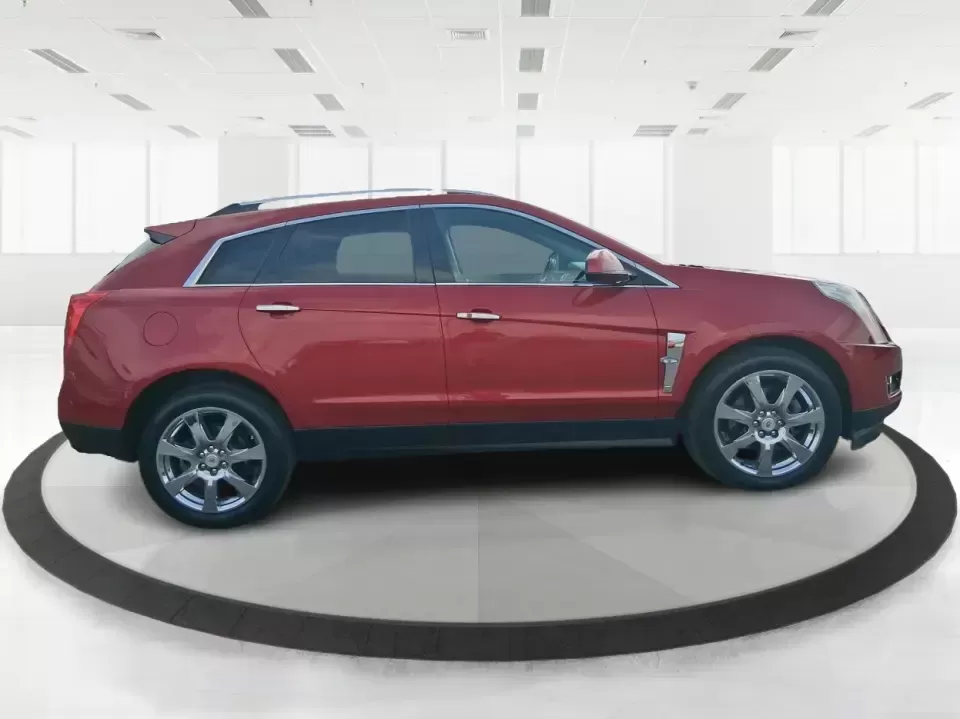 2011 Cadillac SRX Performance Collection (3GYFNEEY2BS) with an Ecotec 3L V-6 gasoline direct injection engine, 6-Speed Automatic transmission, located at 4508 South Dixie Dr, Moraine, OH, 45439, (937) 908-9800, 39.689976, -84.218452 - Picture your next road trip out of Moraine: the family loaded up, playlists ready, and plenty of space for sports gear, groceries, or weekend bags-without giving up comfort or style. This 2011 Cadillac SRX Performance Collection is the kind of SUV that fits real life in the Miami Valley: confident f - Photo#1