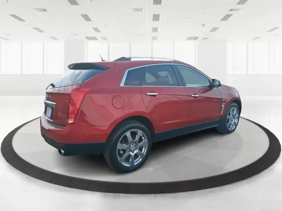 2011 Cadillac SRX Performance Collection (3GYFNEEY2BS) with an Ecotec 3L V-6 gasoline direct injection engine, 6-Speed Automatic transmission, located at 4508 South Dixie Dr, Moraine, OH, 45439, (937) 908-9800, 39.689976, -84.218452 - Picture your next road trip out of Moraine: the family loaded up, playlists ready, and plenty of space for sports gear, groceries, or weekend bags-without giving up comfort or style. This 2011 Cadillac SRX Performance Collection is the kind of SUV that fits real life in the Miami Valley: confident f - Photo#2