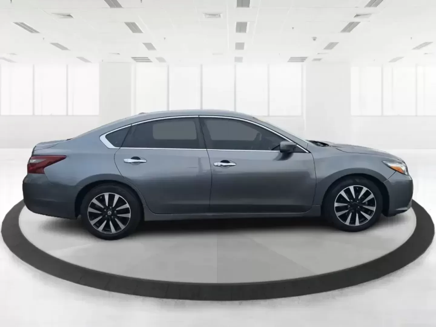 2018 Nissan Altima 2.5 SV (1N4AL3AP0JC) with an 2.5L I-4 DOHC engine, CVT transmission, located at 4508 South Dixie Dr, Moraine, OH, 45439, (937) 908-9800, 39.689976, -84.218452 - Make every mile easier-whether you're tackling a long commute down I75, running kids to practice after school, or planning a weekend day trip to the Miami County Fairgrounds. This 2018 Nissan Altima 2.5 SV in Gun Metallic is the kind of comfortable, efficient sedan that fits real-life schedules in P - Photo#1