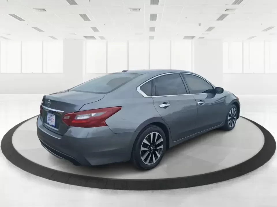 2018 Nissan Altima 2.5 SV (1N4AL3AP0JC) with an 2.5L I-4 DOHC engine, CVT transmission, located at 4508 South Dixie Dr, Moraine, OH, 45439, (937) 908-9800, 39.689976, -84.218452 - Make every mile easier-whether you're tackling a long commute down I75, running kids to practice after school, or planning a weekend day trip to the Miami County Fairgrounds. This 2018 Nissan Altima 2.5 SV in Gun Metallic is the kind of comfortable, efficient sedan that fits real-life schedules in P - Photo#2