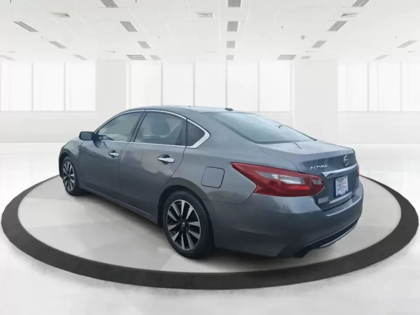 2018 Nissan Altima 2.5 SV (1N4AL3AP0JC) with an 2.5L I-4 DOHC engine, CVT transmission, located at 4508 South Dixie Dr, Moraine, OH, 45439, (937) 908-9800, 39.689976, -84.218452 - Make every mile easier-whether you're tackling a long commute down I75, running kids to practice after school, or planning a weekend day trip to the Miami County Fairgrounds. This 2018 Nissan Altima 2.5 SV in Gun Metallic is the kind of comfortable, efficient sedan that fits real-life schedules in P - Photo#4