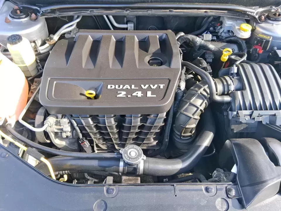 2014 Dodge Avenger SE (1C3CDZAB8EN) with an 2.4L L4 DOHC 16V engine, 4-Speed Automatic transmission, located at 1099 N County Rd 25A , Troy, OH, 45373, (937) 908-9800, 40.057079, -84.212883 - Picture an easy, stress-free daily commute from Moraine to downtown Dayton, with enough comfort for the school run, errands along South Dixie Drive, and the occasional weekend escape to Carillon Historical Park or a movie night near the Dayton Mall. If you want a practical sedan that fits real life- - Photo#11