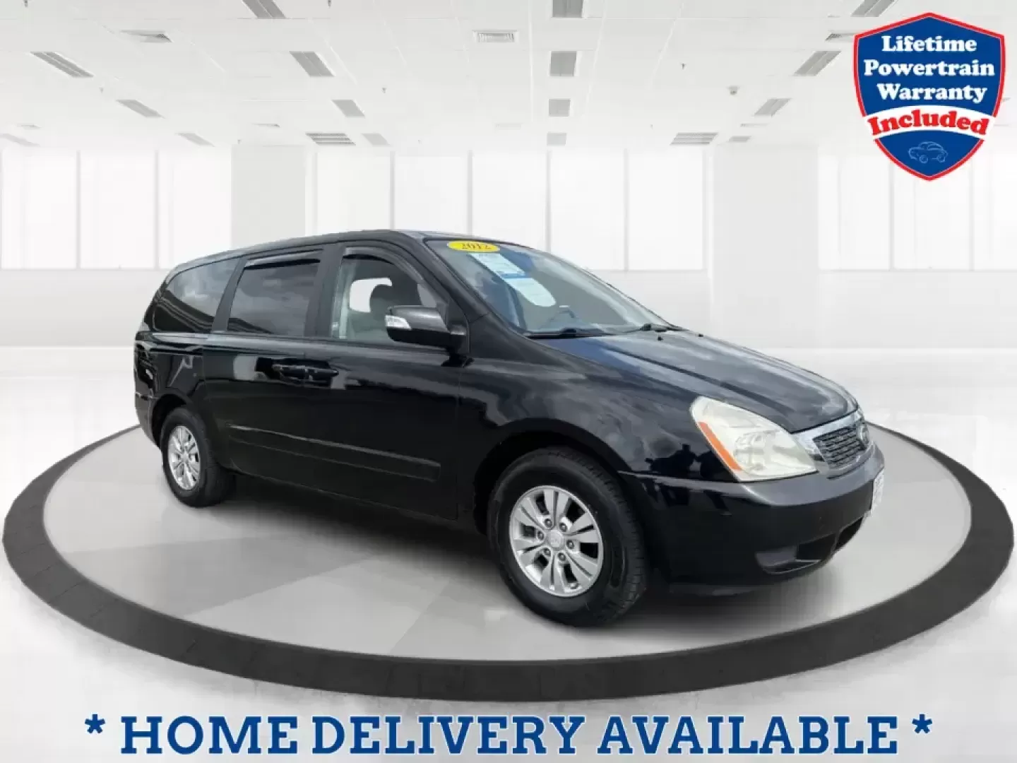 2012 Kia Sedona LX (KNDMG4C78C6) with an 3.5L V-6 DOHC engine, 5-Speed Automatic transmission, located at 1184 Kauffman Ave, Fairborn, OH, 45324, (937) 908-9800, 39.807072, -84.030914 - Picture the next family road trip, soccer Saturday, or airport pickup where everyone actually fits comfortably-plus there's room left for groceries, strollers, and weekend gear. This 2012 Kia Sedona LX in Aurora Black is built for real life: school drop-offs, long commutes across the Miami Valley, a - Photo#0