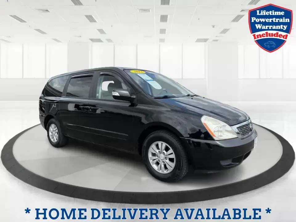 2012 Kia Sedona LX (KNDMG4C78C6) with an 3.5L V-6 DOHC engine, 5-Speed Automatic transmission, located at 401 Woodman Dr, Riverside, OH, 45431, (937) 908-9800, 39.760899, -84.123421 - Picture the next family road trip, soccer Saturday, or airport pickup where everyone actually fits comfortably-plus there's room left for groceries, strollers, and weekend gear. This 2012 Kia Sedona LX in Aurora Black is built for real life: school drop-offs, long commutes across the Miami Valley, a - Photo#0