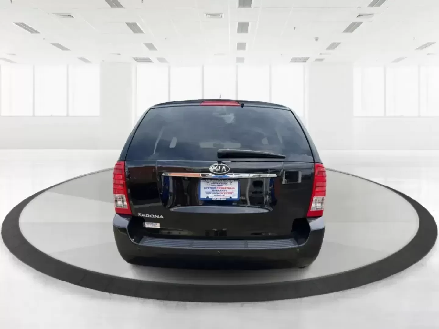 2012 Kia Sedona LX (KNDMG4C78C6) with an 3.5L V-6 DOHC engine, 5-Speed Automatic transmission, located at 1184 Kauffman Ave, Fairborn, OH, 45324, (937) 908-9800, 39.807072, -84.030914 - Picture the next family road trip, soccer Saturday, or airport pickup where everyone actually fits comfortably-plus there's room left for groceries, strollers, and weekend gear. This 2012 Kia Sedona LX in Aurora Black is built for real life: school drop-offs, long commutes across the Miami Valley, a - Photo#3