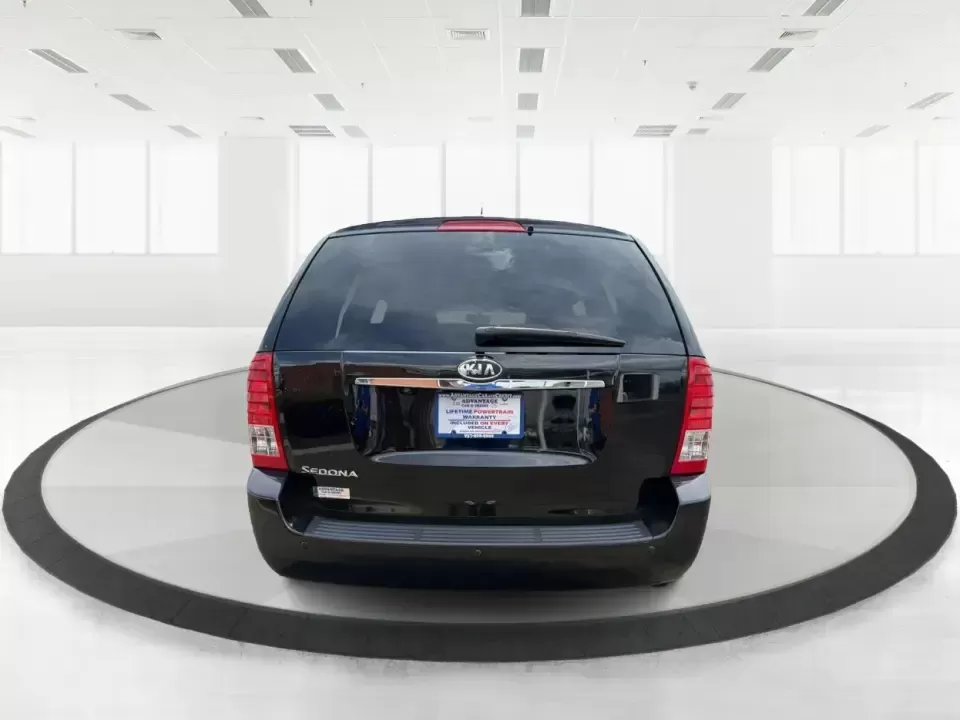 2012 Kia Sedona LX (KNDMG4C78C6) with an 3.5L V-6 DOHC engine, 5-Speed Automatic transmission, located at 401 Woodman Dr, Riverside, OH, 45431, (937) 908-9800, 39.760899, -84.123421 - Picture the next family road trip, soccer Saturday, or airport pickup where everyone actually fits comfortably-plus there's room left for groceries, strollers, and weekend gear. This 2012 Kia Sedona LX in Aurora Black is built for real life: school drop-offs, long commutes across the Miami Valley, a - Photo#3