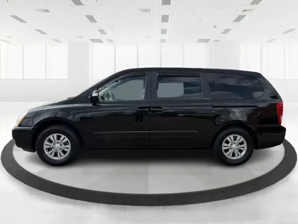 2012 Kia Sedona LX (KNDMG4C78C6) with an 3.5L V-6 DOHC engine, 5-Speed Automatic transmission, located at 401 Woodman Dr, Riverside, OH, 45431, (937) 908-9800, 39.760899, -84.123421 - Picture the next family road trip, soccer Saturday, or airport pickup where everyone actually fits comfortably-plus there's room left for groceries, strollers, and weekend gear. This 2012 Kia Sedona LX in Aurora Black is built for real life: school drop-offs, long commutes across the Miami Valley, a - Photo#5