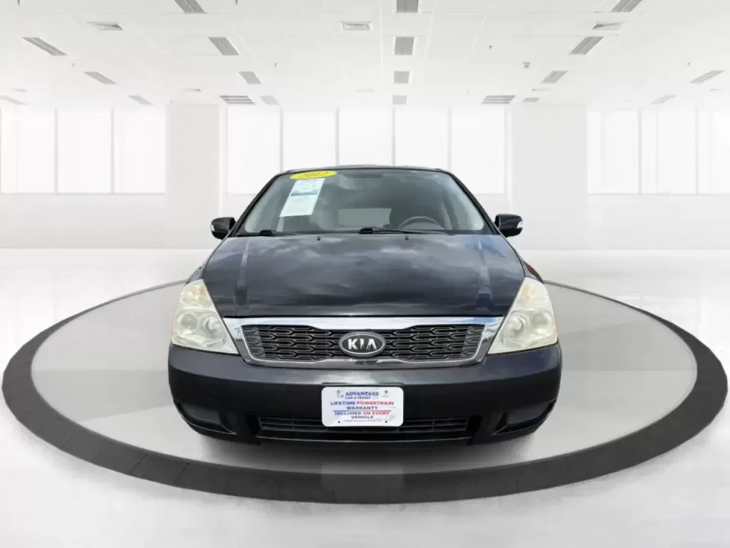 2012 Kia Sedona LX (KNDMG4C78C6) with an 3.5L V-6 DOHC engine, 5-Speed Automatic transmission, located at 1184 Kauffman Ave, Fairborn, OH, 45324, (937) 908-9800, 39.807072, -84.030914 - Picture the next family road trip, soccer Saturday, or airport pickup where everyone actually fits comfortably-plus there's room left for groceries, strollers, and weekend gear. This 2012 Kia Sedona LX in Aurora Black is built for real life: school drop-offs, long commutes across the Miami Valley, a - Photo#7
