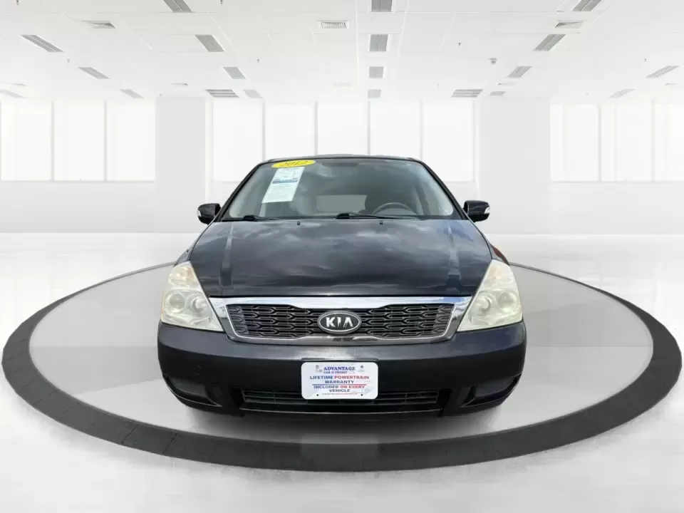 2012 Kia Sedona LX (KNDMG4C78C6) with an 3.5L V-6 DOHC engine, 5-Speed Automatic transmission, located at 401 Woodman Dr, Riverside, OH, 45431, (937) 908-9800, 39.760899, -84.123421 - Picture the next family road trip, soccer Saturday, or airport pickup where everyone actually fits comfortably-plus there's room left for groceries, strollers, and weekend gear. This 2012 Kia Sedona LX in Aurora Black is built for real life: school drop-offs, long commutes across the Miami Valley, a - Photo#7