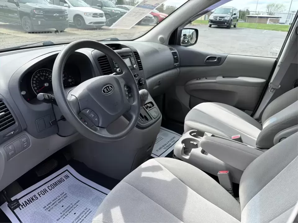 2012 Kia Sedona LX (KNDMG4C78C6) with an 3.5L V-6 DOHC engine, 5-Speed Automatic transmission, located at 401 Woodman Dr, Riverside, OH, 45431, (937) 908-9800, 39.760899, -84.123421 - Picture the next family road trip, soccer Saturday, or airport pickup where everyone actually fits comfortably-plus there's room left for groceries, strollers, and weekend gear. This 2012 Kia Sedona LX in Aurora Black is built for real life: school drop-offs, long commutes across the Miami Valley, a - Photo#9