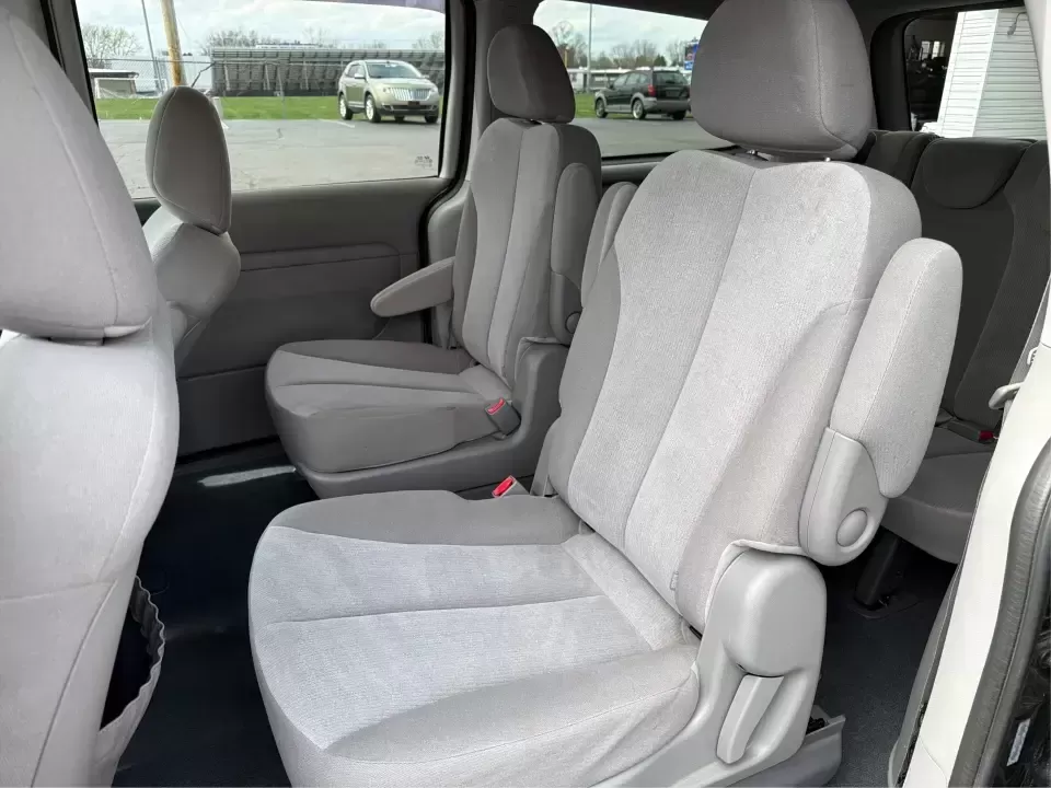 2012 Kia Sedona LX (KNDMG4C78C6) with an 3.5L V-6 DOHC engine, 5-Speed Automatic transmission, located at 401 Woodman Dr, Riverside, OH, 45431, (937) 908-9800, 39.760899, -84.123421 - Picture the next family road trip, soccer Saturday, or airport pickup where everyone actually fits comfortably-plus there's room left for groceries, strollers, and weekend gear. This 2012 Kia Sedona LX in Aurora Black is built for real life: school drop-offs, long commutes across the Miami Valley, a - Photo#10