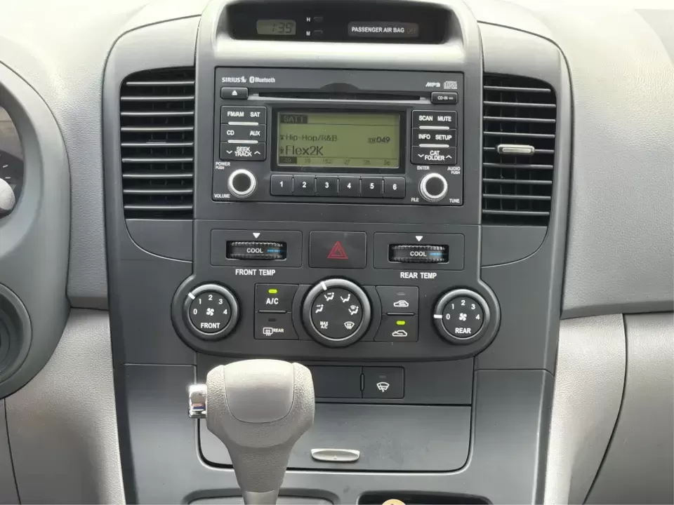 2012 Kia Sedona LX (KNDMG4C78C6) with an 3.5L V-6 DOHC engine, 5-Speed Automatic transmission, located at 401 Woodman Dr, Riverside, OH, 45431, (937) 908-9800, 39.760899, -84.123421 - Picture the next family road trip, soccer Saturday, or airport pickup where everyone actually fits comfortably-plus there's room left for groceries, strollers, and weekend gear. This 2012 Kia Sedona LX in Aurora Black is built for real life: school drop-offs, long commutes across the Miami Valley, a - Photo#13