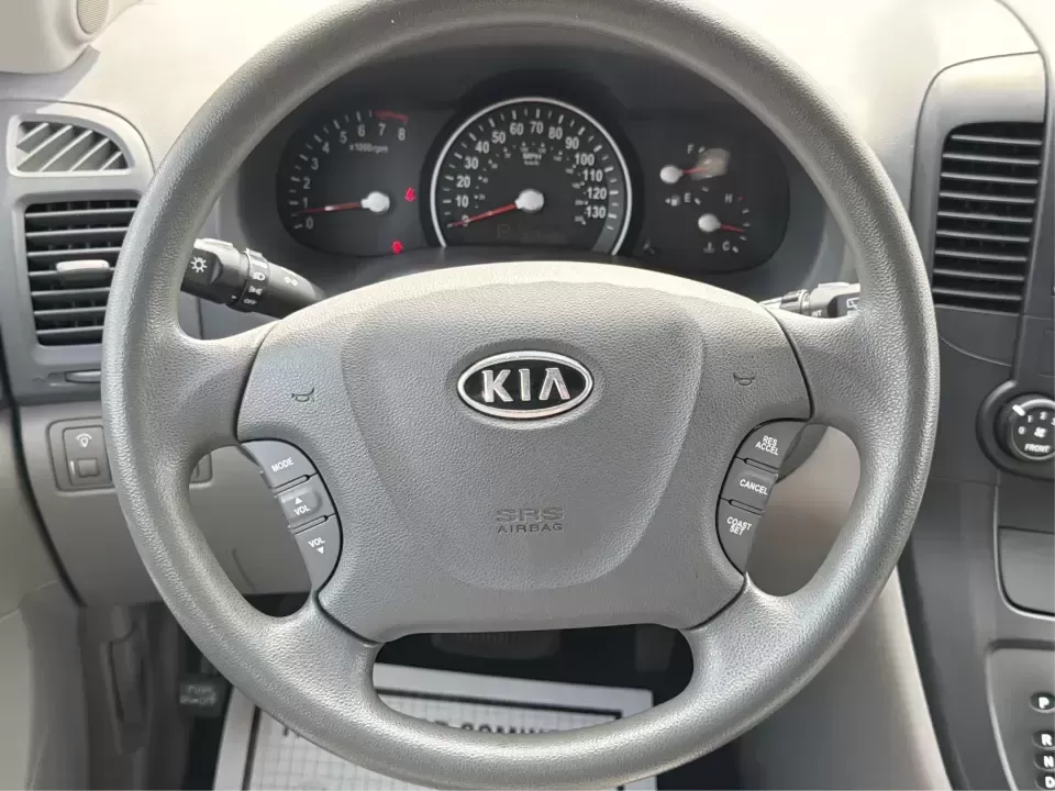 2012 Kia Sedona LX (KNDMG4C78C6) with an 3.5L V-6 DOHC engine, 5-Speed Automatic transmission, located at 401 Woodman Dr, Riverside, OH, 45431, (937) 908-9800, 39.760899, -84.123421 - Picture the next family road trip, soccer Saturday, or airport pickup where everyone actually fits comfortably-plus there's room left for groceries, strollers, and weekend gear. This 2012 Kia Sedona LX in Aurora Black is built for real life: school drop-offs, long commutes across the Miami Valley, a - Photo#16