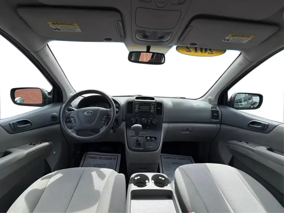 2012 Kia Sedona LX (KNDMG4C78C6) with an 3.5L V-6 DOHC engine, 5-Speed Automatic transmission, located at 401 Woodman Dr, Riverside, OH, 45431, (937) 908-9800, 39.760899, -84.123421 - Picture the next family road trip, soccer Saturday, or airport pickup where everyone actually fits comfortably-plus there's room left for groceries, strollers, and weekend gear. This 2012 Kia Sedona LX in Aurora Black is built for real life: school drop-offs, long commutes across the Miami Valley, a - Photo#20