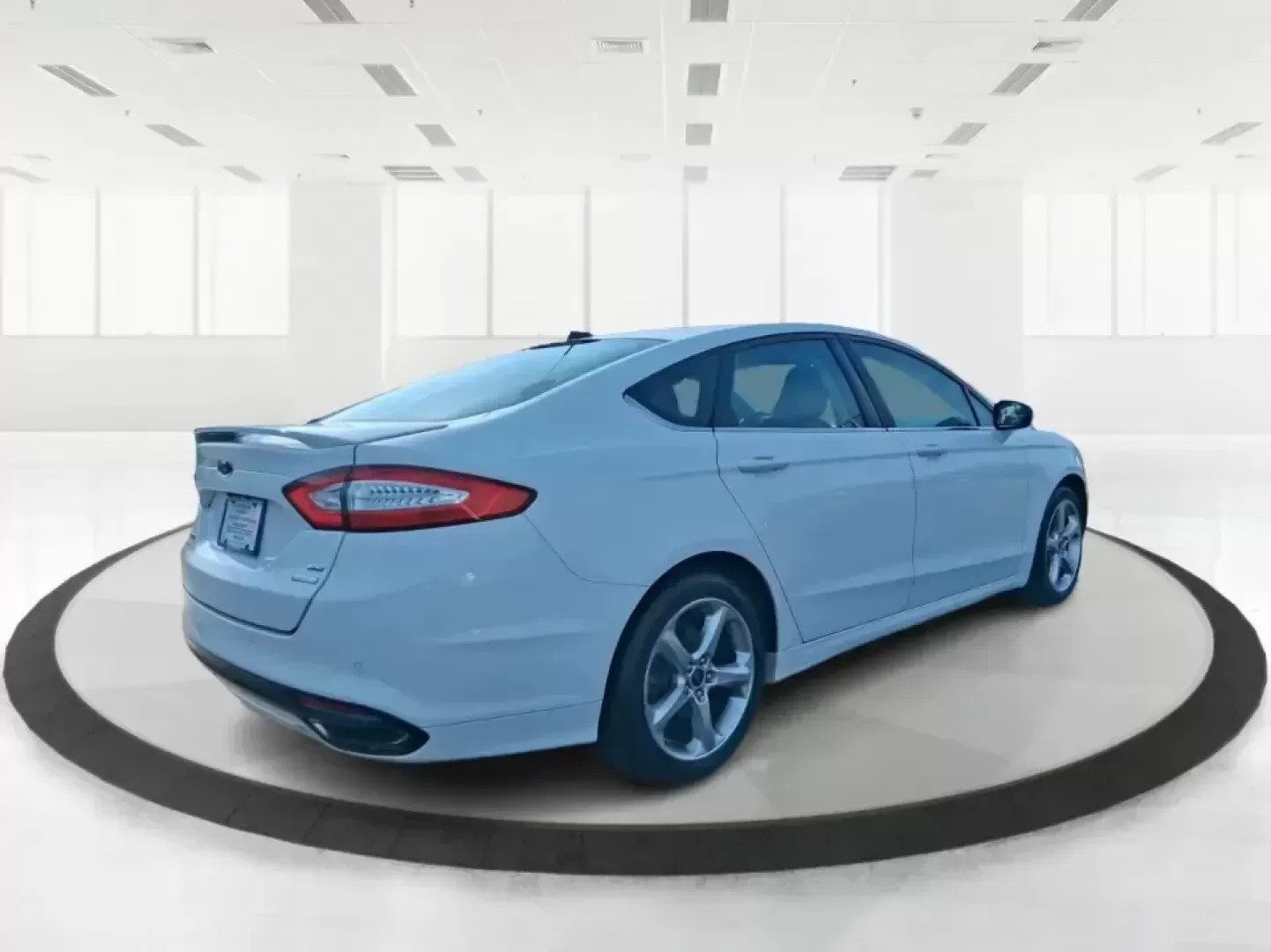 2016 Ford Fusion SE (3FA6P0H91GR) with an 2.0L L4 DOHC 16V engine, 6-Speed Automatic transmission, located at 880 E. National Road, Vandalia, OH, 45377, (937) 908-9800, 39.891918, -84.183594 - Need a dependable commuter that can handle I75 traffic, school drop-offs, and weekend runs to Dayton without draining your budget? This 2016 Ford Fusion SE in Oxford White is the kind of practical, comfortable sedan that fits real life in Vandalia-smooth for daily driving, efficient on regular unlea - Photo#2