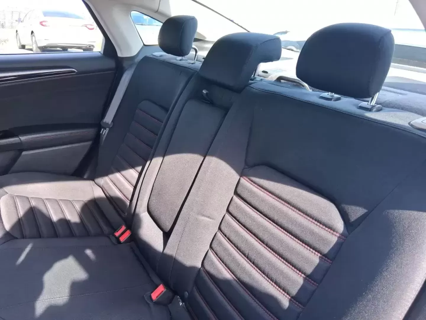 2016 Ford Fusion SE (3FA6P0H91GR) with an 2.0L L4 DOHC 16V engine, 6-Speed Automatic transmission, located at 880 E. National Road, Vandalia, OH, 45377, (937) 908-9800, 39.891918, -84.183594 - Need a dependable commuter that can handle I75 traffic, school drop-offs, and weekend runs to Dayton without draining your budget? This 2016 Ford Fusion SE in Oxford White is the kind of practical, comfortable sedan that fits real life in Vandalia-smooth for daily driving, efficient on regular unlea - Photo#10