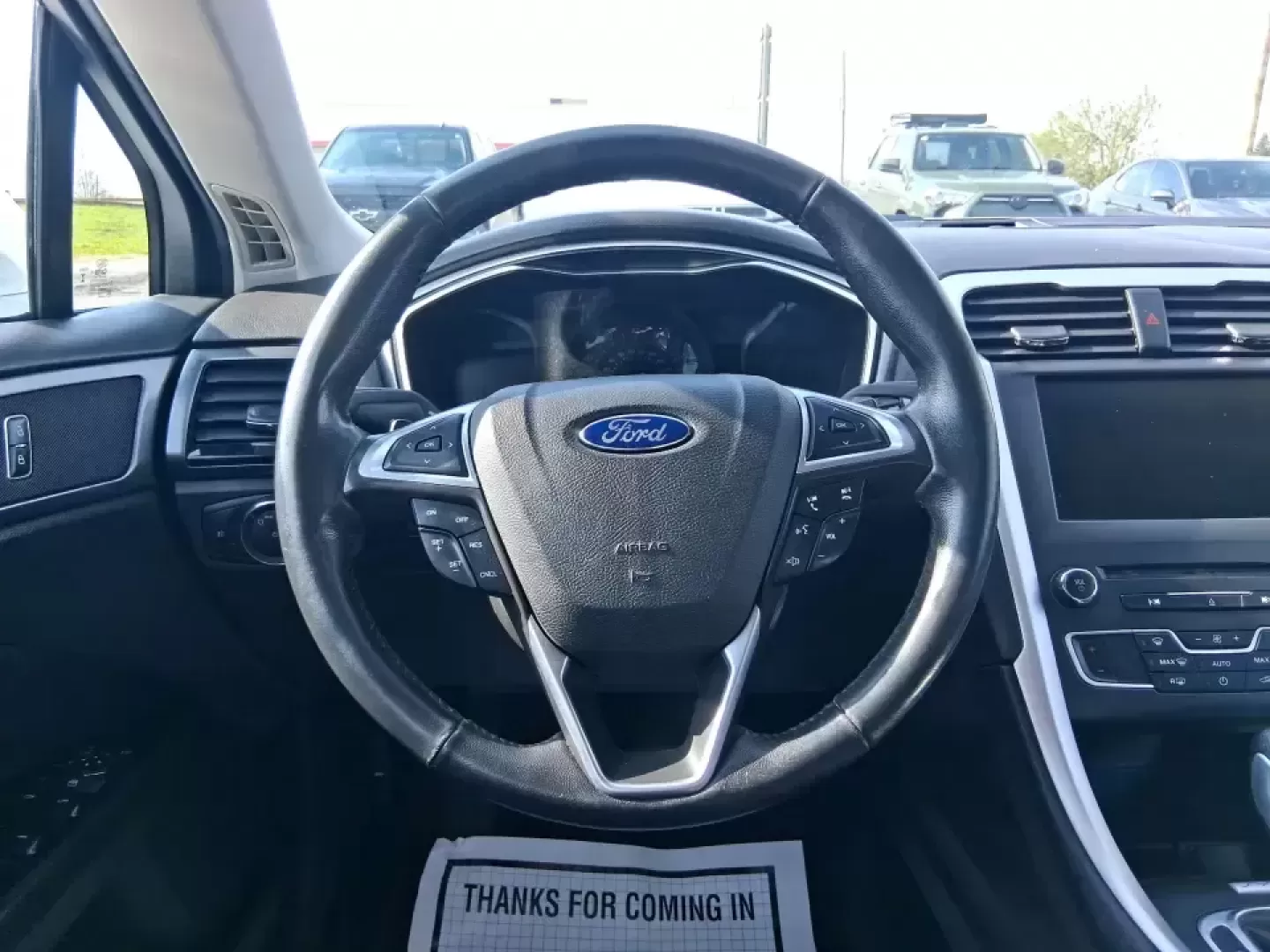 2016 Ford Fusion SE (3FA6P0H91GR) with an 2.0L L4 DOHC 16V engine, 6-Speed Automatic transmission, located at 880 E. National Road, Vandalia, OH, 45377, (937) 908-9800, 39.891918, -84.183594 - Need a dependable commuter that can handle I75 traffic, school drop-offs, and weekend runs to Dayton without draining your budget? This 2016 Ford Fusion SE in Oxford White is the kind of practical, comfortable sedan that fits real life in Vandalia-smooth for daily driving, efficient on regular unlea - Photo#16