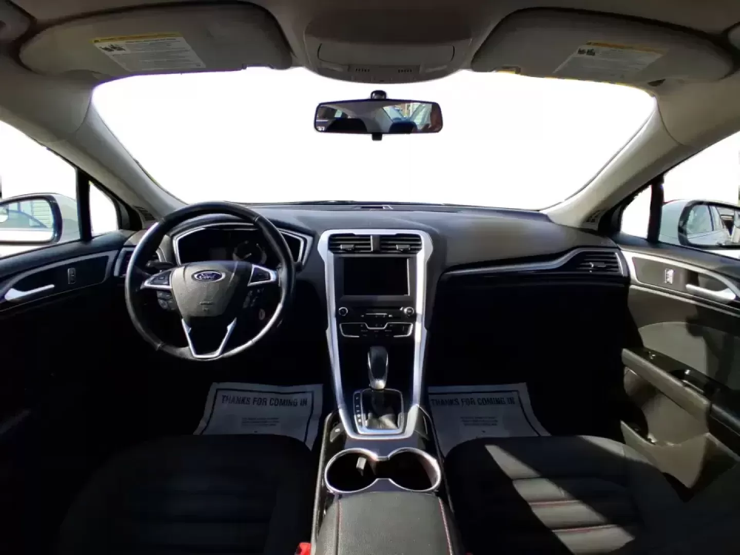 2016 Ford Fusion SE (3FA6P0H91GR) with an 2.0L L4 DOHC 16V engine, 6-Speed Automatic transmission, located at 880 E. National Road, Vandalia, OH, 45377, (937) 908-9800, 39.891918, -84.183594 - Need a dependable commuter that can handle I75 traffic, school drop-offs, and weekend runs to Dayton without draining your budget? This 2016 Ford Fusion SE in Oxford White is the kind of practical, comfortable sedan that fits real life in Vandalia-smooth for daily driving, efficient on regular unlea - Photo#21