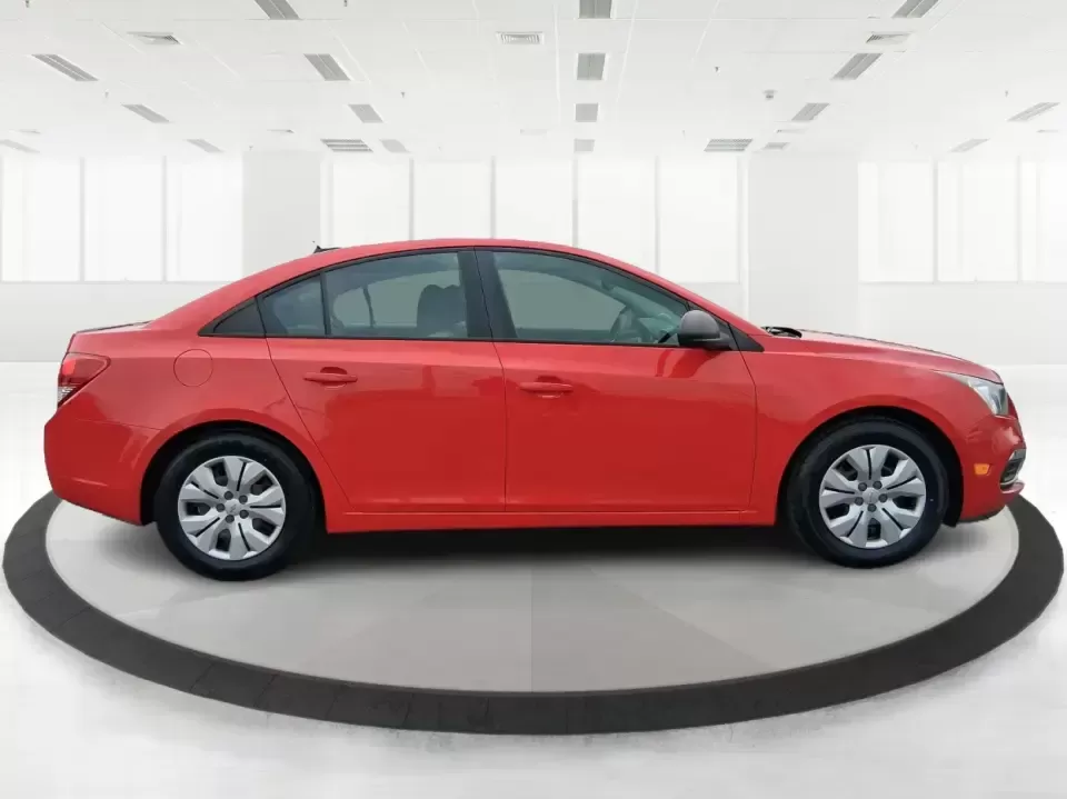 2015 Chevrolet Cruze LS Auto (1G1PA5SG9F7) with an ECOTEC 1.8L I-4 DOHC engine, 6-Speed Automatic transmission, located at 8750 N County Rd 25A, Piqua, OH, 45356, (937) 908-9800, 40.164391, -84.232513 - Picture an easy, affordable daily commute that still feels comfortable on I75, quick trips to downtown Piqua for dinner, and weekend errands that don't drain your budget at the pump. This 2015 Chevrolet Cruze LS Auto in eye-catching Red Hot is a smart, practical sedan for commuters, first-time buyer - Photo#1