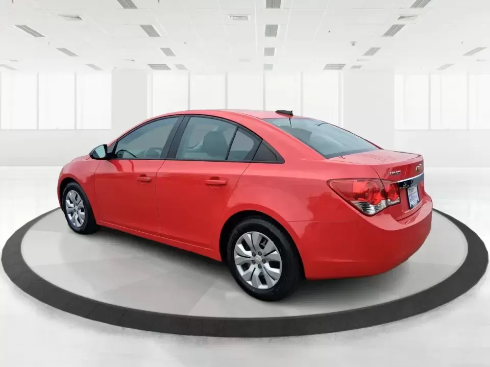 2015 Chevrolet Cruze LS Auto (1G1PA5SG9F7) with an ECOTEC 1.8L I-4 DOHC engine, 6-Speed Automatic transmission, located at 8750 N County Rd 25A, Piqua, OH, 45356, (937) 908-9800, 40.164391, -84.232513 - Picture an easy, affordable daily commute that still feels comfortable on I75, quick trips to downtown Piqua for dinner, and weekend errands that don't drain your budget at the pump. This 2015 Chevrolet Cruze LS Auto in eye-catching Red Hot is a smart, practical sedan for commuters, first-time buyer - Photo#4
