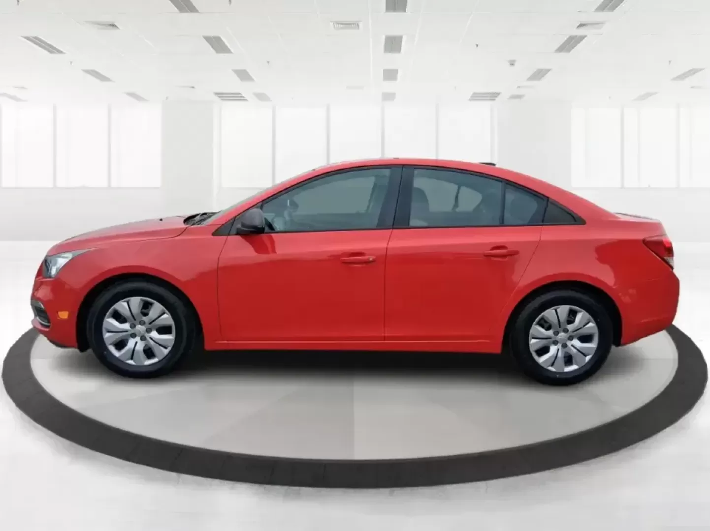 2015 Chevrolet Cruze LS Auto (1G1PA5SG9F7) with an ECOTEC 1.8L I-4 DOHC engine, 6-Speed Automatic transmission, located at 8750 N County Rd 25A, Piqua, OH, 45356, (937) 908-9800, 40.164391, -84.232513 - Picture an easy, affordable daily commute that still feels comfortable on I75, quick trips to downtown Piqua for dinner, and weekend errands that don't drain your budget at the pump. This 2015 Chevrolet Cruze LS Auto in eye-catching Red Hot is a smart, practical sedan for commuters, first-time buyer - Photo#5