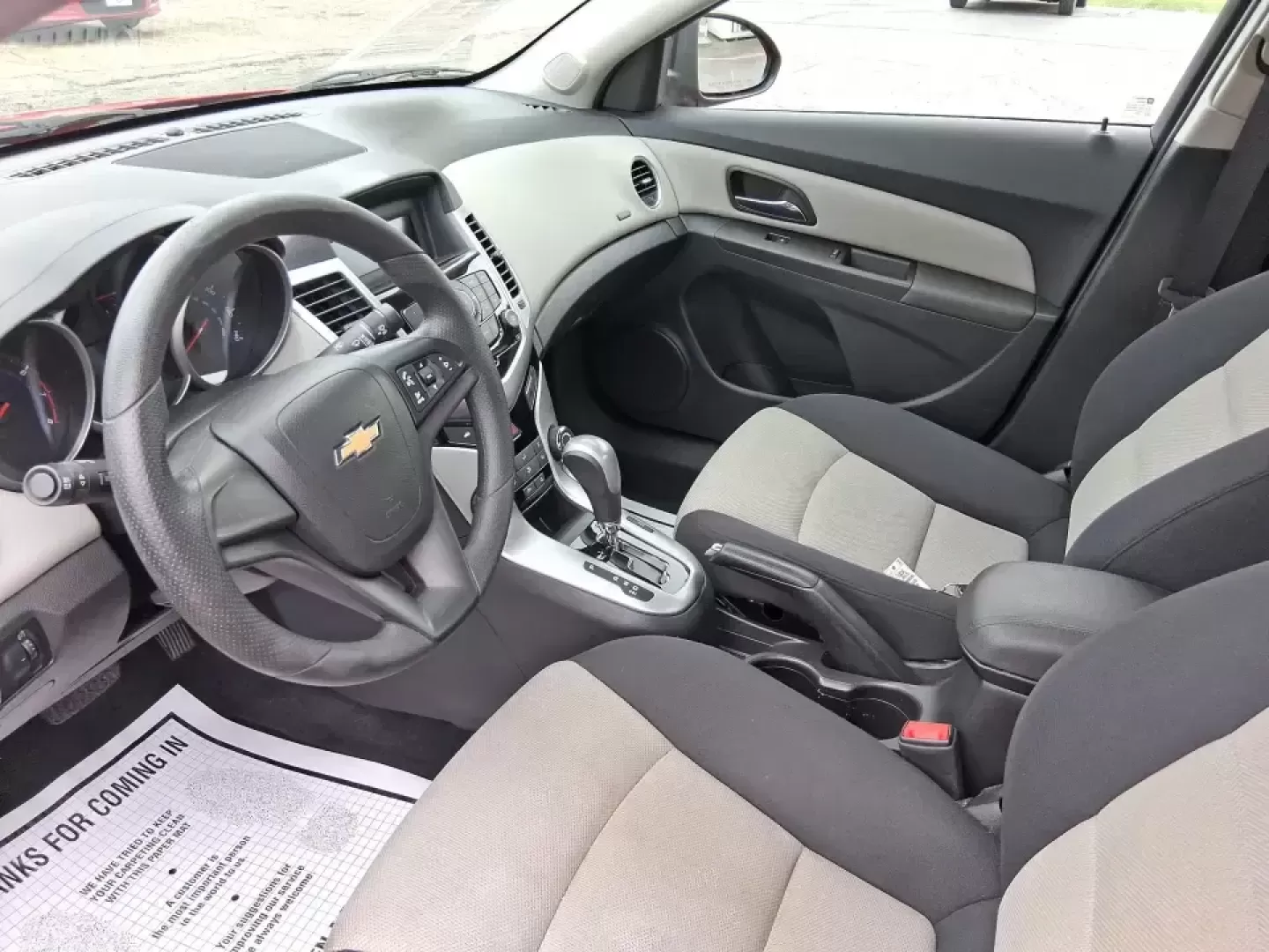 2015 Chevrolet Cruze LS Auto (1G1PA5SG9F7) with an ECOTEC 1.8L I-4 DOHC engine, 6-Speed Automatic transmission, located at 8750 N County Rd 25A, Piqua, OH, 45356, (937) 908-9800, 40.164391, -84.232513 - Picture an easy, affordable daily commute that still feels comfortable on I75, quick trips to downtown Piqua for dinner, and weekend errands that don't drain your budget at the pump. This 2015 Chevrolet Cruze LS Auto in eye-catching Red Hot is a smart, practical sedan for commuters, first-time buyer - Photo#9