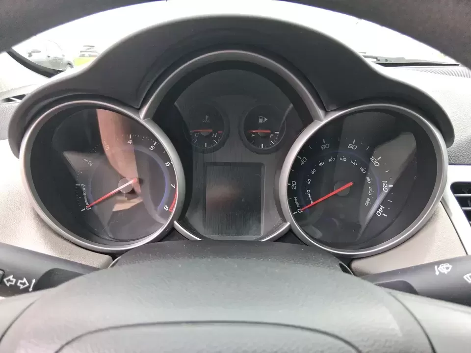 2015 Chevrolet Cruze LS Auto (1G1PA5SG9F7) with an ECOTEC 1.8L I-4 DOHC engine, 6-Speed Automatic transmission, located at 8750 N County Rd 25A, Piqua, OH, 45356, (937) 908-9800, 40.164391, -84.232513 - Picture an easy, affordable daily commute that still feels comfortable on I75, quick trips to downtown Piqua for dinner, and weekend errands that don't drain your budget at the pump. This 2015 Chevrolet Cruze LS Auto in eye-catching Red Hot is a smart, practical sedan for commuters, first-time buyer - Photo#15