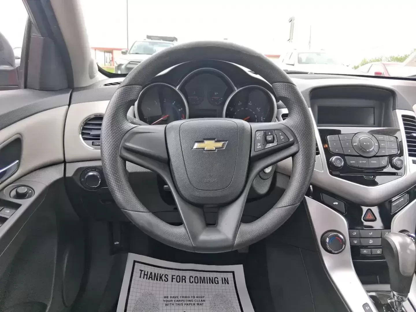 2015 Chevrolet Cruze LS Auto (1G1PA5SG9F7) with an ECOTEC 1.8L I-4 DOHC engine, 6-Speed Automatic transmission, located at 8750 N County Rd 25A, Piqua, OH, 45356, (937) 908-9800, 40.164391, -84.232513 - Picture an easy, affordable daily commute that still feels comfortable on I75, quick trips to downtown Piqua for dinner, and weekend errands that don't drain your budget at the pump. This 2015 Chevrolet Cruze LS Auto in eye-catching Red Hot is a smart, practical sedan for commuters, first-time buyer - Photo#16