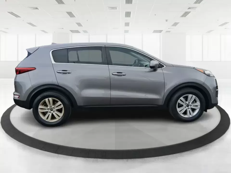 2018 Kia Sportage LX (KNDPM3AC0J7) with an Theta II 2.4L I-4 gasoline direct injection engine, 6A transmission, located at 1099 N County Rd 25A , Troy, OH, 45373, (937) 908-9800, 40.057079, -84.212883 - Weekend road trips to the Miami County Fair, daily commutes down I75, or quick errands between Downtown Troy and the shops near West Main Street-this 2018 Kia Sportage LX is the kind of compact SUV that fits real life. With its versatile crossover layout, confident road manners, and smart cargo spac - Photo#1